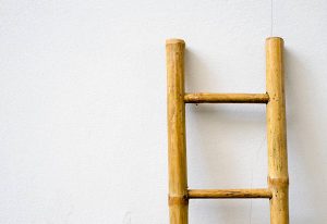 bamboo ladder on the white wall